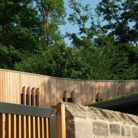 Reclaimed stone and Siberian larch to visitors Centre